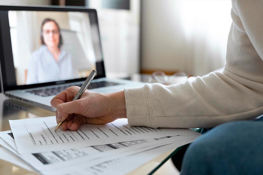 young man having a video conference meeting