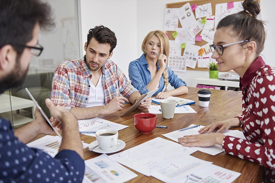 Creative team analyzing campaign